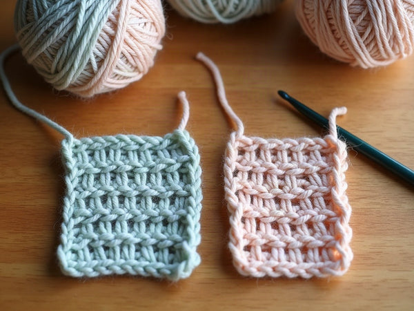 Two crochet swatches side by side showing uneven loose tension versus even tight tension, with pastel yarn, a crochet hook and stitch markers on a wooden table