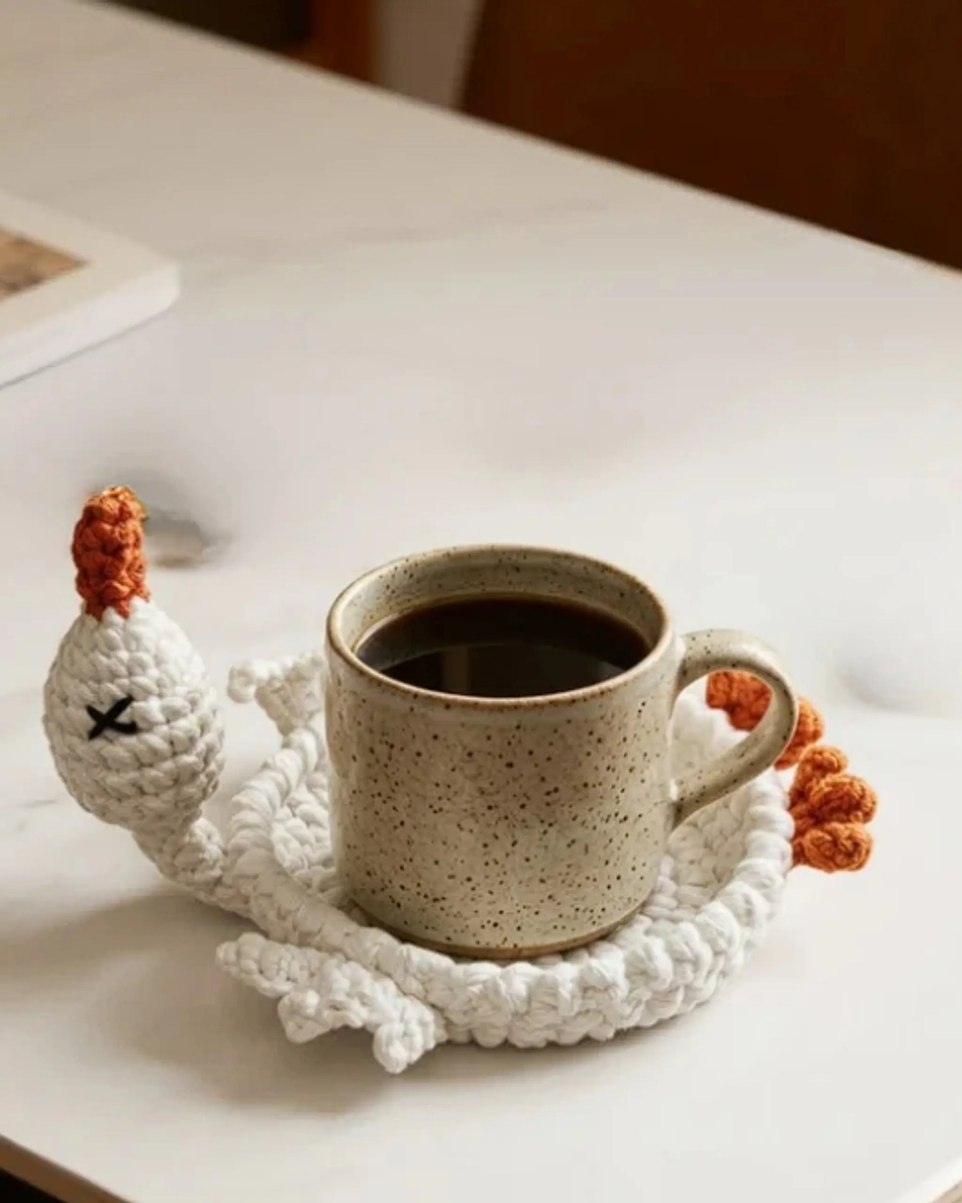 crochet coaster book page 1 — 20-in-1 animal pattern collection PDF