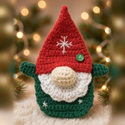 Crochet Christmas gnome ornament with a red snowflake hat and white beard