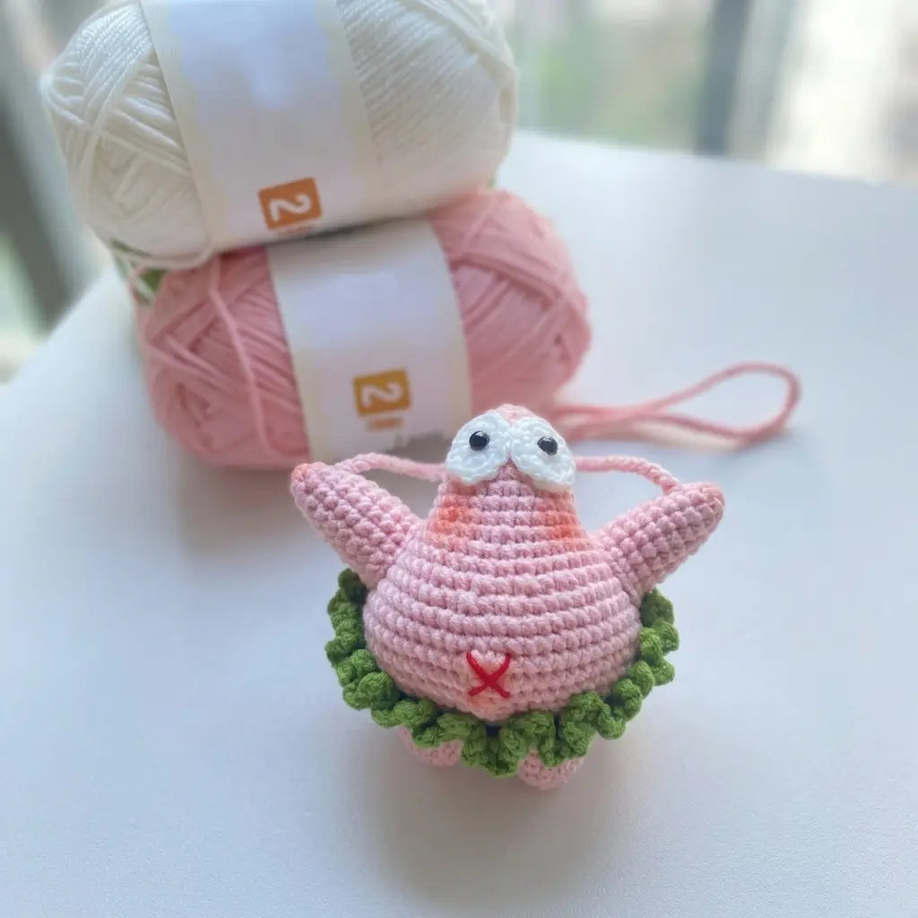 Close-up detail of crochet starfish car charm stitches by MrsCrochetWorld