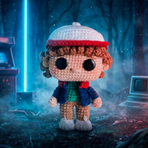 Crocheted Dustin character inspired by Stranger Things, handmade amigurumi doll with curly hair and cap, digital crochet pattern.